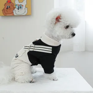 Detail view of monochrome pet overalls with corduroy texture and Milk embroidery