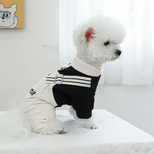 Cute pet overalls for dogs and cats featuring contrast black and white ribbed fabric