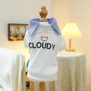 Detail of pet shirt with CLOUDY embroidery and metal D-ring for leash attachment