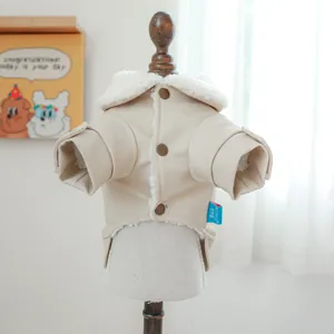 Close-up of warm pet jacket with faux suede fabric, fleece lining, and button closure
