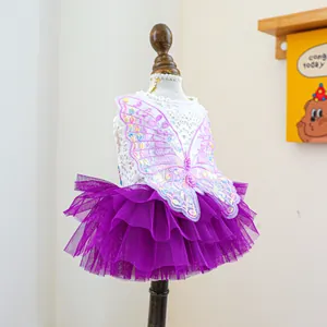 Detail of pet fairy tutu dress featuring lace crochet and purple sequin butterfly embroidery