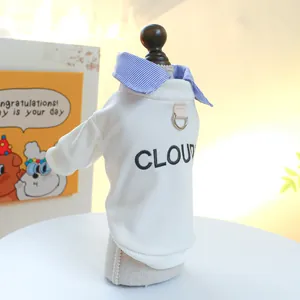 White pet sweatshirt detail with CLOUD embroidery and metal D-ring for leash attachment