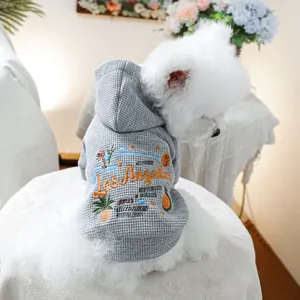 Grey waffle knit pet hoodie with Los Angeles embroidery worn by a white dog
