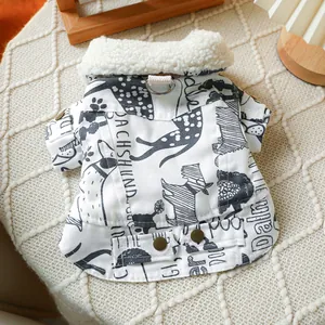 Detail of warm dog coat with canine illustrations, soft sherpa collar, and metal D-ring