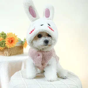 Detail of warm pink plush pet vest and white rabbit ear hood for small dogs and cats