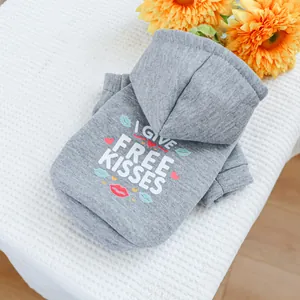 Close-up of grey pet hoodie featuring I GIVE FREE KISSES print and knit cotton texture