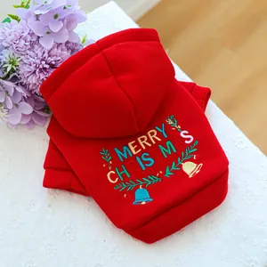 Detail of red Christmas pet hoodie with Merry Christmas embroidery and bell pattern