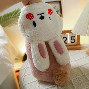 Close-up of pink and white plush pet coat with rabbit ears and a fluffy tail