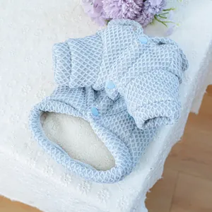 Detail of light blue waffle texture pet hoodie with warm thick white fleece lining