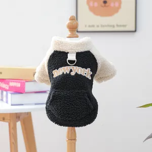 Detail of New York embroidery and metal D-ring on black fleece pet hoodie
