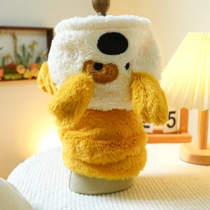 Detailed view of plush yellow pet vest with cute bear embroidery and thick faux fur