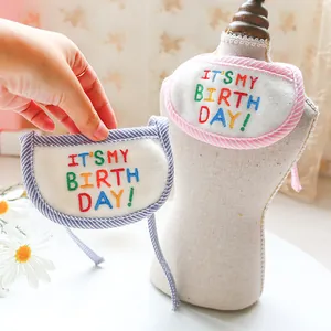 Pink and blue striped birthday pet bib with It's My Birthday embroidery for cats and dogs