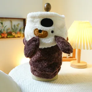 Detail of pet fleece jacket with 3D ears on a wooden mannequin in a cozy room