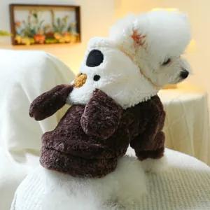 Detail of warm bicolor fleece hoodie with cute bear design for small dogs on a Bichon