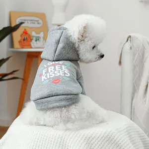 Detail of light gray pet hoodie with I GIVE FREE KISSES print and red lip graphics
