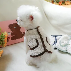 Detail of warm lamb wool pet vest with metal snap buttons and decorative back pocket