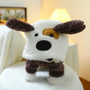 Detail of warm white puppy fleece hoodie with brown ears worn by small dog on chair