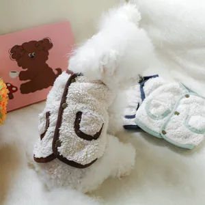 Detail of warm sherpa pet vests with cute back pockets and metal snap buttons