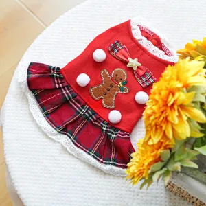 Festive red pet dress with gingerbread embroidery and tartan pleated hem for cats or dogs