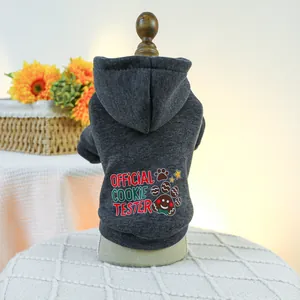 Detail of grey pet hoodie with Official Cookie Tester text on a wooden mannequin
