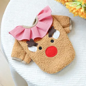 Detail of pet Christmas hoodie with brown fleece fabric and reindeer design