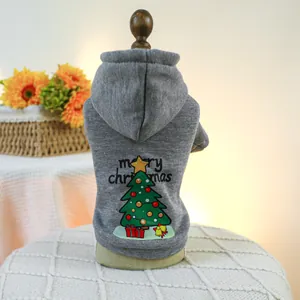 Close-up of grey pet hoodie featuring Christmas tree print and Merry Christmas text