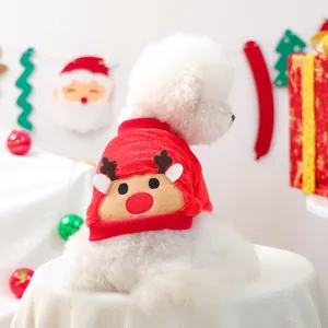 Festive red pet Christmas sweater with reindeer embroidery on a small white dog