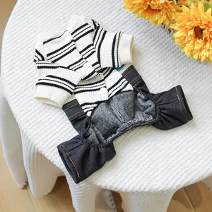 Detailed view of striped dog jumpsuit with warm fleece lining and denim style pants