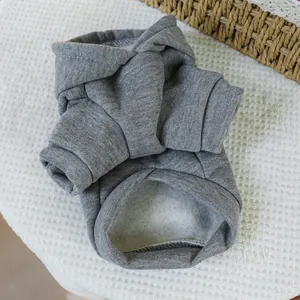 Flat lay of a grey pet hoodie with soft fleece lining and warm sweatshirt material