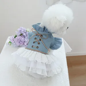 Blue denim pet dress with white lace skirt and brown lace-up back for small dogs