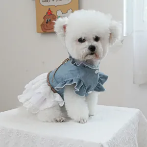 Chic denim pet dress with layered white lace and brown woven belt for dogs and cats