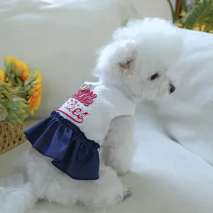 Detail of dog summer dress featuring waffle fabric, red embroidery and a D-ring harness