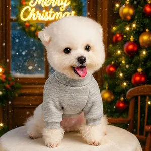 Close-up of a grey knit dog sweater with ribbed neck and festive Christmas background