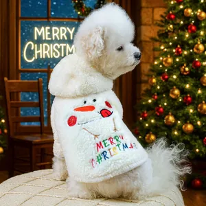 White plush dog sweater with snowman embroidery and Merry Christmas text in holiday setting