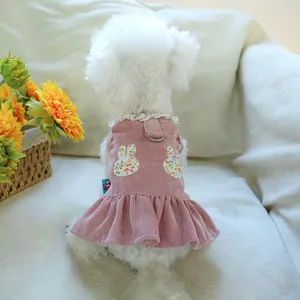 Pink corduroy dog dress with floral bunny patches and lace collar for small pets