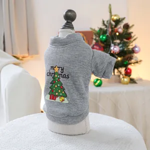 Detail of gray pet hoodie with Merry Christmas tree print on soft knitted fabric