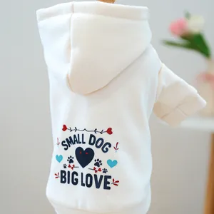 Detail of cream pet hoodie showing Small Dog Big Love print and ribbed cuffs