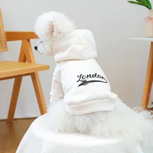 Detail of off-white cotton pet hoodie featuring a London graphic print for small dogs