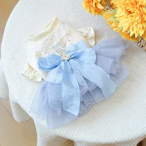 Dog princess dress with blue mesh skirt, lace trim and silver snowflake sequin patterns