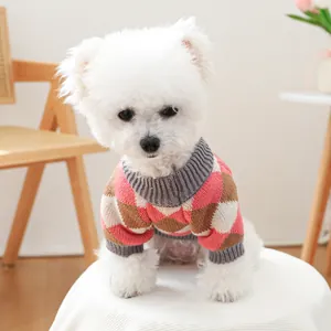 Detail of pink and brown argyle knit sweater for small dogs with ribbed cuffs