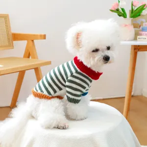 Retro colorful striped pet sweater with red turtleneck worn by a white Bichon dog