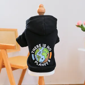 Detail of black pet hoodie featuring an eco-friendly graphic and soft cotton texture