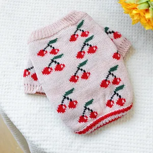 Pink pet knit sweater with red cherry patterns and ribbed edges for dogs and cats