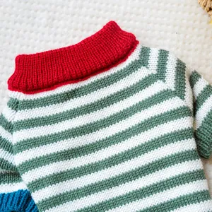 Detailed close-up of the vintage striped knit pet sweater with high collar and soft texture