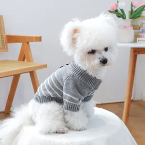Detail of grey striped knit sweater for dogs with high collar and back button accents