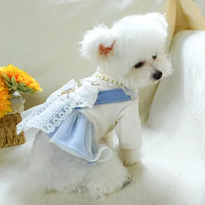Sweet pet dress for small dogs with white knit top, blue tulle skirt and lace bow detail