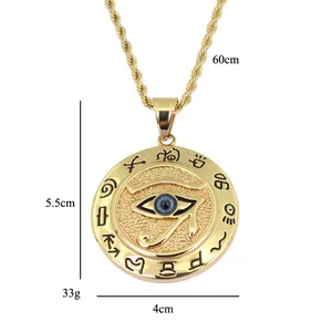 Detail of Eye of Horus coin pendant with twisted rope chain and Egyptian engravings