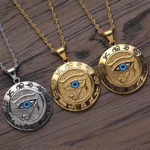 Detailed look at Eye of Horus stainless steel pendants with blue inlay on wood background