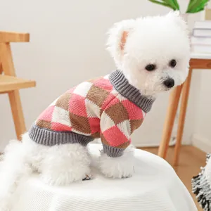 Pink and brown diamond pattern pet knit sweater for small dogs and cats in cozy home setting
