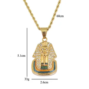 Detailed view of gold Pharaoh pendant with dimensions 5.1x2.6cm and 60cm twist chain
